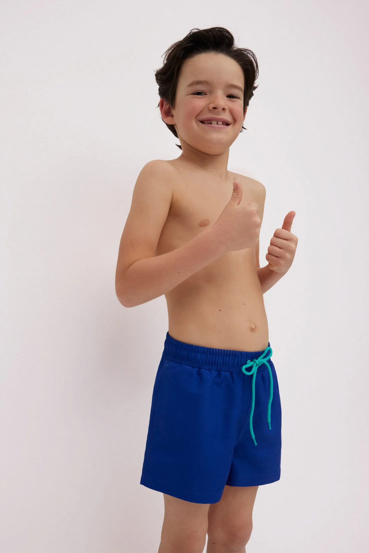 Bañador niño corto liso marino