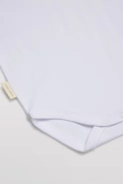 Body bebé básico manga corta solapas blanco