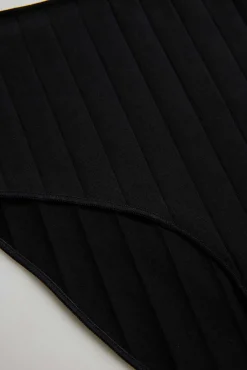 Braga alta canalé negro