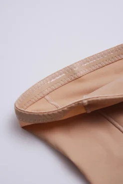 Braguita alta reductora compresión media nude