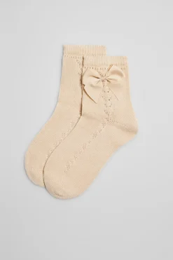 Calcetines calados infantiles beige
