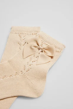 Calcetines calados infantiles beige