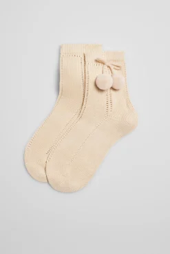 Calcetines calados infantiles beige