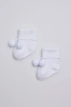 Calcetines canalé con borlas recién nacido blanco