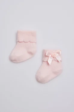 Calcetines canalé con lazo recién nacido rosa