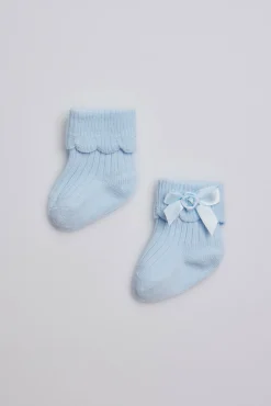 Calcetines canalé con lazo recién nacido celeste