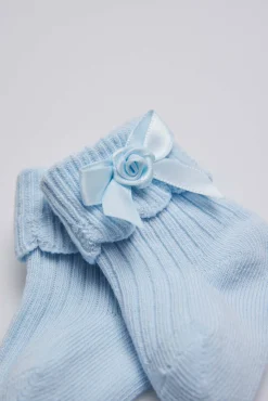 Calcetines canalé con lazo recién nacido celeste