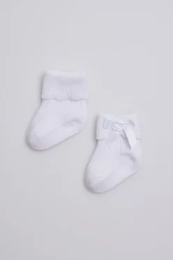 Calcetines canalé con lazo recién nacido blanco