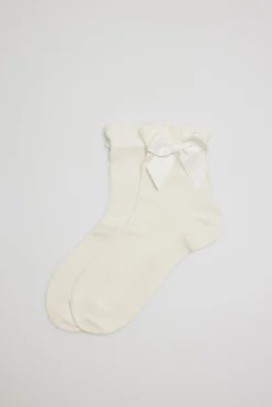 Calcetines infantiles de ceremonia lazada en marfil