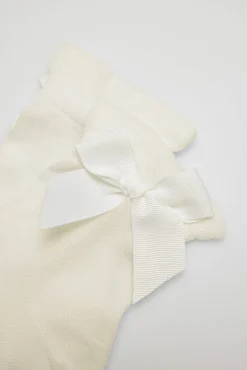 Calcetines infantiles de ceremonia lazada en marfil