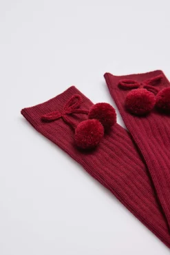 Calcetines largos pompones granate