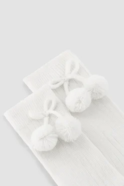 Calcetines largos pompones blanco