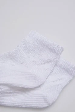 Calcetines perlé recién nacido blanco
