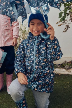 Chubasquero infantil con forro interior polar Dino