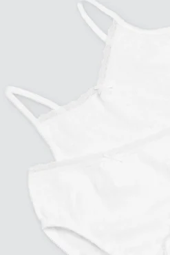 Conjunto camiseta y braguita caladas de niña blanco