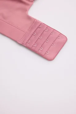 Conjunto deportivo rosa de sujeción alta y legging efecto push up Colección compressive