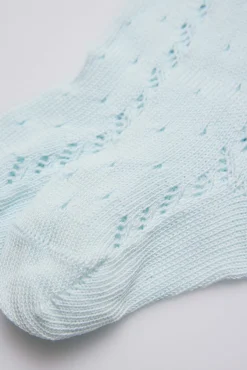 Leotardo calado celeste