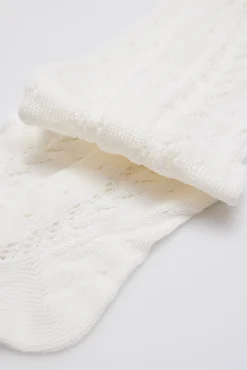 Leotardo calado marfil