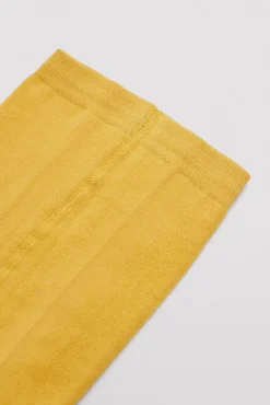 Leotardo clásico bebé amarillo mostaza