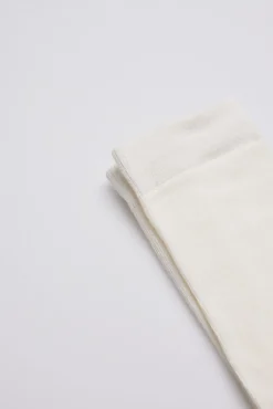 Leotardo clásico bebé marfil