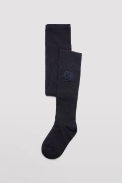 Leotardo niña detalle pompón marino