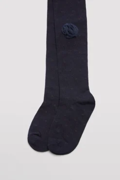 Leotardo niña detalle pompón marino