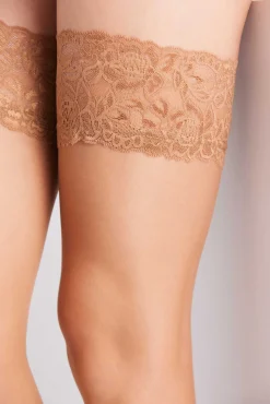 Medias con liga 15 denier beige