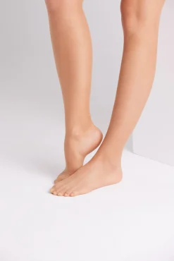 Medias con liga 10 denier natural