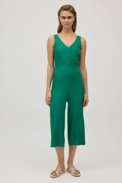 Mono con lino lazo en la espalda verde