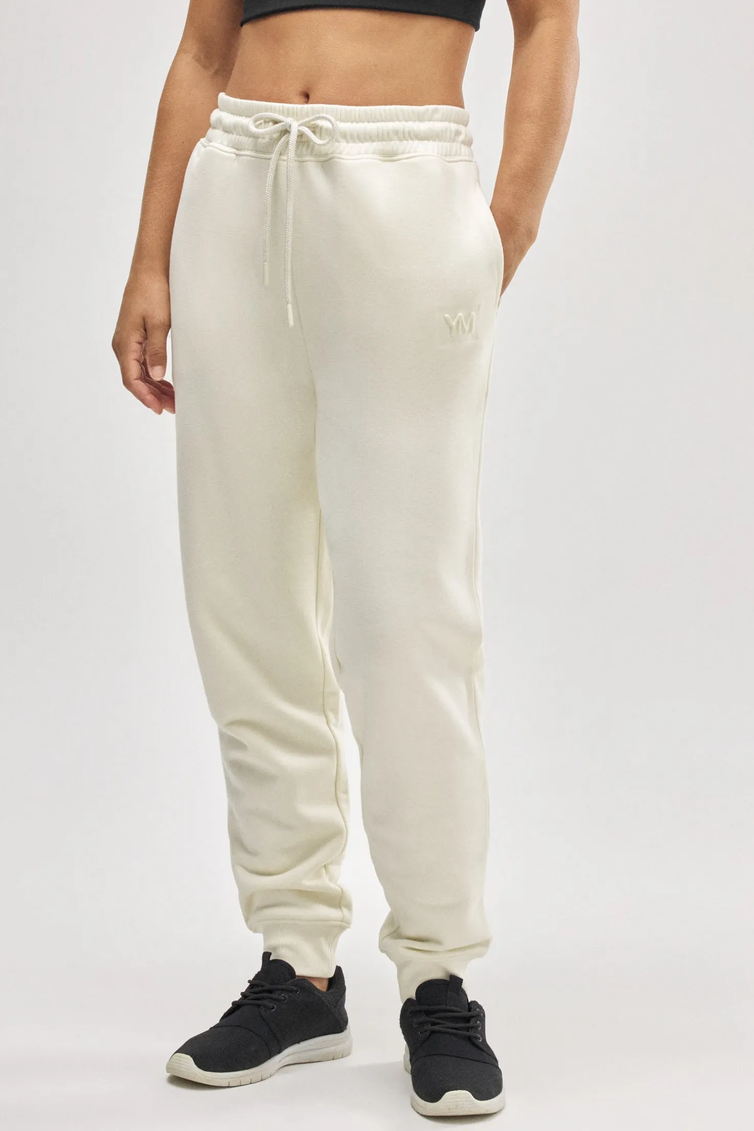 Pantalón jogger deportivo afelpado con cintura ajustable marfil