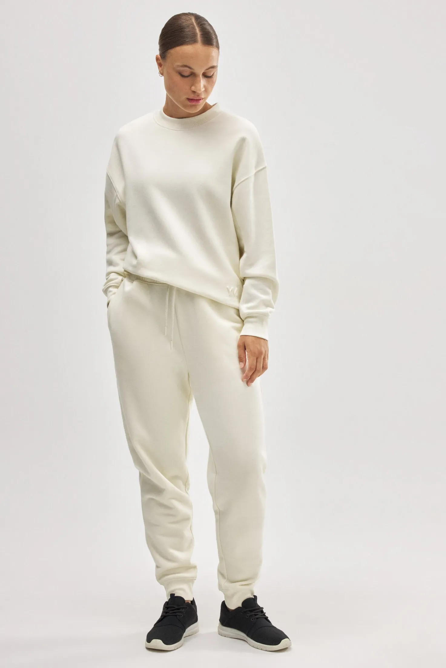 Pantalón jogger deportivo afelpado con cintura ajustable marfil