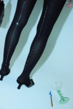 Panty con banda de brillos 70 denier