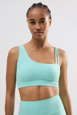 Sujetador deportivo asimétrico sujeción ligera celeste