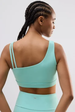 Sujetador deportivo asimétrico sujeción ligera celeste