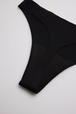 Tanga láser invisible negro