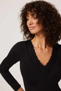 TÉRMICO Body manga larga negro cuanto mide de largo