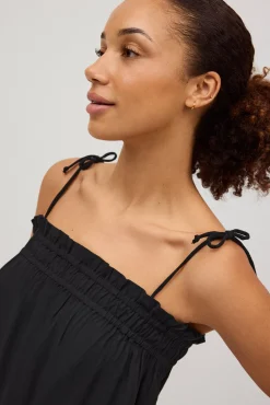 Vestido corto tirantes anudados liso negro