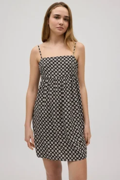 Vestido corto tirantes regulables estampado flores blanco y negro