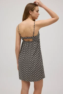 Vestido corto tirantes regulables estampado flores blanco y negro